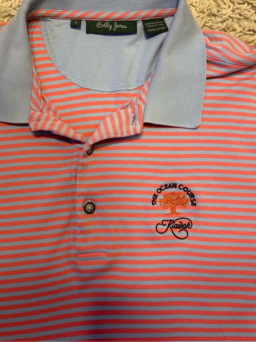 Bobby Jones The Ocean Course Kiawah Coral and Light Blue Striped Polo Shirt